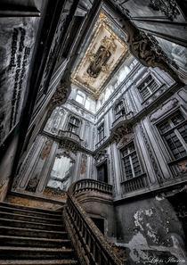 The stair hall of a derelict palace in Lisbon Portugal  By Kwolas Forest