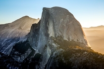 The sun rises over the Half Dome in Yosemite CA  By Stephen Moehle