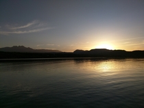 The sun rising over Arizonas lake Roosevelt 