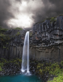 The Svartifoss Black Fall cutting through dark lava columns in south Iceland  photo by Jonathan Besler