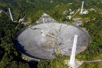 The Telescope at the Arecibo Observatory in Puerto Rico has collapsed presumably in a much less awesome fashion than in Goldeneye