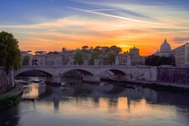 The Tiber River at Sunset Rome - Looking towards St Peters Basilica in the Vatican 