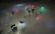 The Toronto skyline submerged in fog 