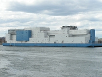 The Vernon C Bain Correctional Center is an -bed jail barge used to hold inmates in New York City Built for  million and opened in  it is the worlds largest operational prison ship Note the outdoor basketball courts at top-left 