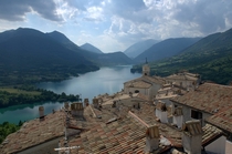The view from a rooftop overlooking Lake Barrea Italy 