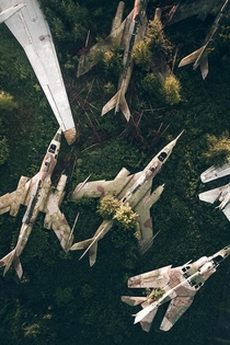 These are aircraft meant to be in the Central Air Force Museum at Monino but got abandoned httpsentopwarru-nashel-redkie-sverhzvukovye-jak--zarosshie-derevjamihtml