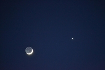 This beautiful picture I took of a lunar eclipse with Venus showing near it