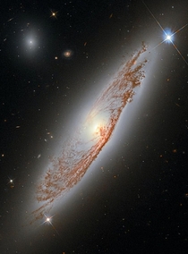 This image shows the spiral galaxy NGC  which is found in the constellation of Virgo and was first documented by William Herschel in  see comments