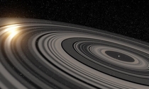 This is exoplanet Jb aka Saturn on steroids due to its enormous ring system