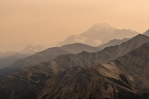 This is not Mars These are mountains in Jasper Canada Earth under a cloud of smoke caused by the wildfires raging on the US West coast 