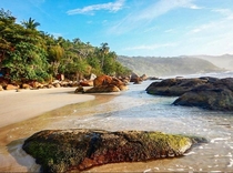 This is the famous Aventureiros Beach Ilha Grande Brazil Ilha Grande or Big Island is covered by Atlantic Forest and rocky with hundred of beautiful beaches 