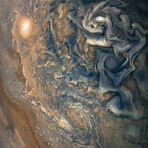 This looks like an abstract painting but its actually a picture of Jupiters clouds taken by Juno in 