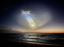 This Mornings SpaceX Launch Refracted the Light in a Really Cool Way In the center you can see the booster landing itself