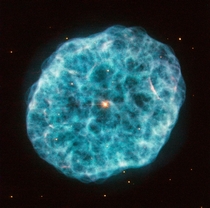 This new image from Hubbles Wide Field Planetary Camera  showcases NGC  nickname the Oyster Nebula a complex planetary nebula located in the large but faint constellation of Camelopardalis The Giraffe 