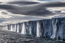 This photo of ice waterfalls in Svalbard by Paul Nicklen was chosen by Pearl Jam to be their new album cover 