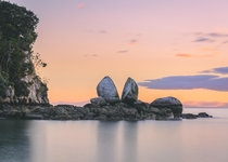 This rock in New Zealand is naturally split this way Tokangawh also known as Split Apple Rock at Sunrise 