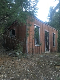 This very old abandoned house or shack I came across it in the woods in Idaho Springs CO