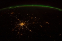 This view of the Aurora Borealis was photographed from the International Space Station by an astronaut orbiting over Russia -- latitude  longitude  -- on  October  at  GMT 