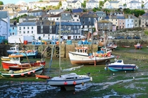 Tide is Out in Mevagissey Harbour Cornwall UK