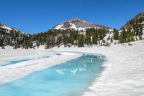 Today I saw Lassen Peak reflected in newly melted snow in Lassen Volcanic National Park 