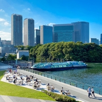 Tokyo  Takeshiba park and ferry pier Hamarikyu Gardens and Shiodome business district in background