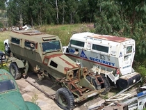 Two old rusting kudette APCs