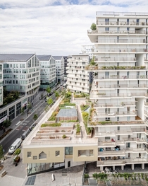 Two tower blocks of a new social housing project built on a former rail yard in th arrondissement of Paris