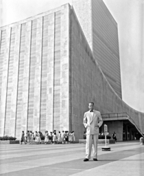 UN Secretary General Dag Hammarskjld in front of the United Nations Headquarters building 