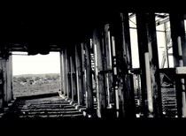 Under the old headframe of a mine