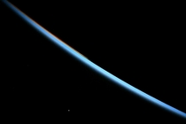 Venus at sunrise The blue glow of Earths atmosphere shimmers as the station orbits our planet Credits NASA