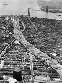 Verrazano-Narrows Bridge and Brooklyn approaches under construction in  
