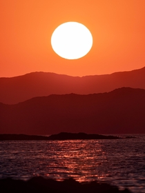 Vibrant sunset in Crete through a telescope