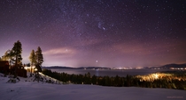 Vibrant winter stars over Lake Tahoe a week ago Thats Siriuss bright reflection on the water 
