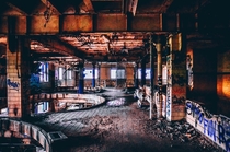 Vibrant yet desolate interior of abandoned brewery 