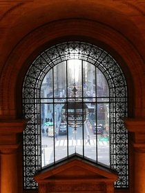 View across th Ave down Est Street from New York Public Library
