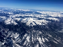 View of mountains in Colorado from an airplane  x