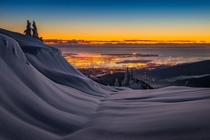 View of Vancouver from the mountains overlooking the city  by Artur Stanisz