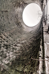 View up from the inside of an abandoned stone grain silo 
