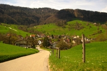 Village of Brschwil Switzerland nestled in the green hills of the Jura Mountains 