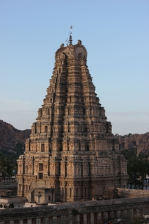 Virupaksha temple main tower over entrance gate at Hampi India Built in the dravidian style 