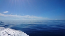 Wake disturbing the calm Solomon Sea PNG 