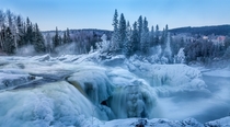 Water and ice Ristafallet Waterfall in Jamtland Sweden  Photo by Andreas Sandstrm xpost from rSwedenPics