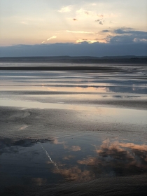 West coast of Ireland walked out on the beach in Liscannor and was blown away by the low tide and reflecting sunset 