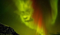 What looks to be a face in the Northern Lights above Iceland  Photographed by Tom Mackie