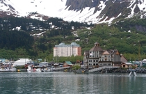 Whittier AK  A very unusual small city in stunningly beautiful surroundings Of the  people who live here almost all live in that one apartment tower in back