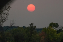Wildfire smoke caused a beautiful sunset over Southern Wisconsin this evening 