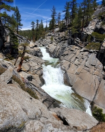 Yosemite creek flowing with snow melt Yosemite National Park CA USA 