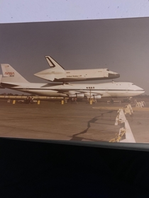 You might be able to google a pic from a repost of a Space Shuttle pic but this is a screenshot of a physical pic taken by my mother with a Processed by KODAK and NOV  A stamp on the back