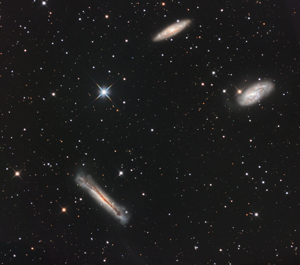  After over  months of learning I was able to take this image of the Leo Triplet fom my patio   hours over  nights