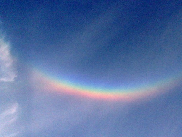 Circumzenithal arc a brightly colored halo caused by light refraction in ice crystals